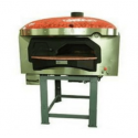 Rotating base wood-fired oven with domed cooking chamber and separate combustion chamber